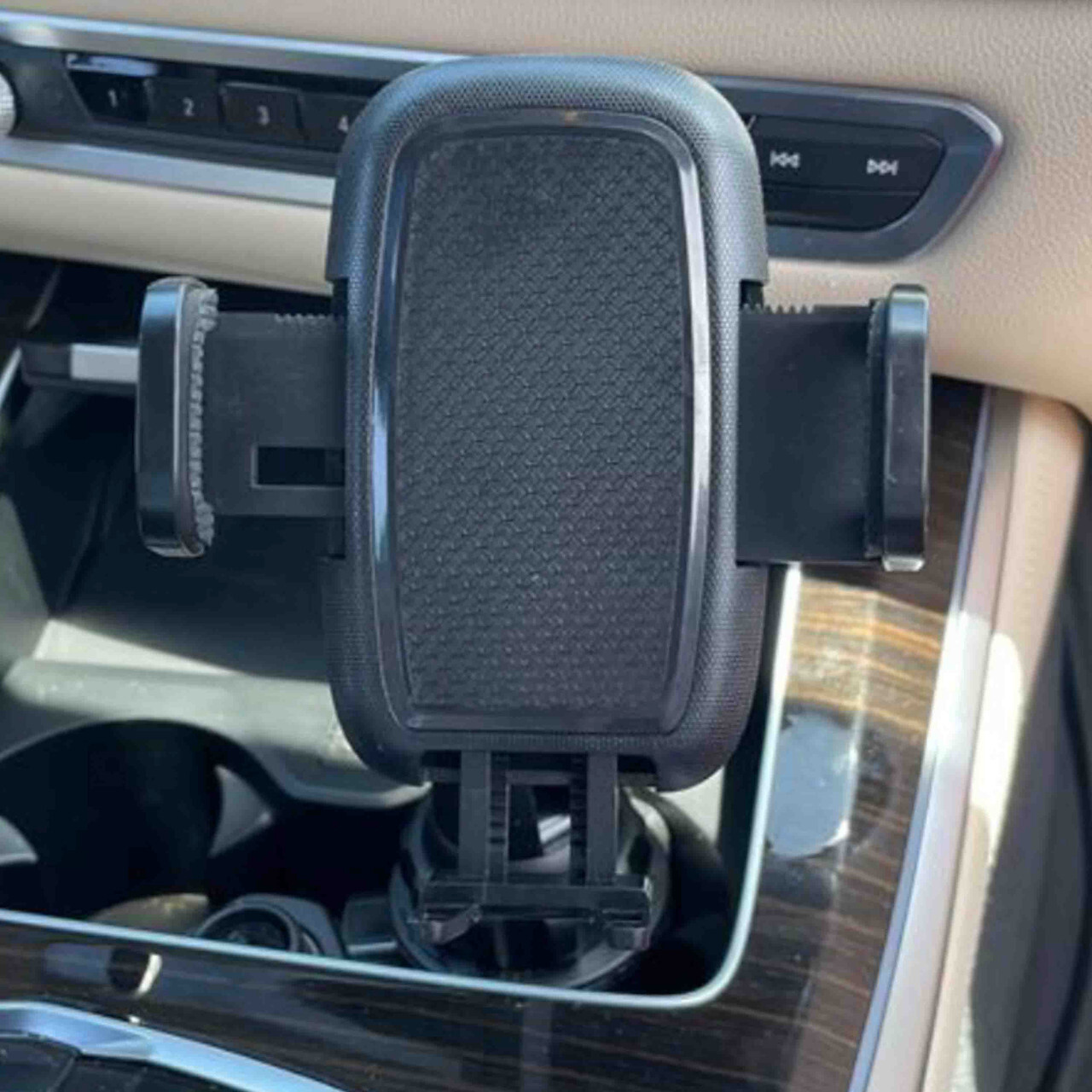 Car air vent phone holder mount designed for secure hands-free mobile use.